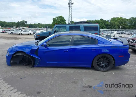 2013 Dodge Charger Road/Track z USA, uszkodzony, nr VIN 2C3CDXCT5DH642851